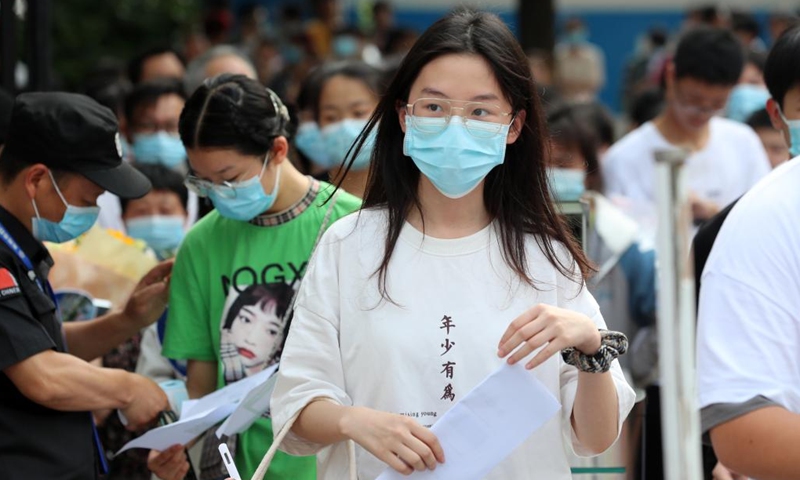 Students go to their examination site to get familiar with the enviroment ahead of the national college entrance exam in Hengyang, central China's Hunan Province, June 6, 2022. A new high of 11.93 million students will take China's national college entrance exam for 2022, also known as gaokao. Aside from a postponement in Shanghai due to COVID-19, the exam will be held on June 7 and 8 nationwide.
