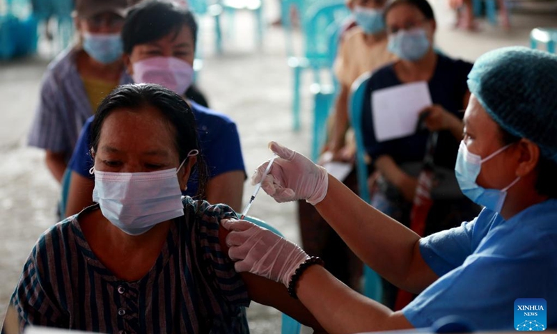 A woman receives a dose of COVID-19 vaccine in Yangon, Myanmar, June 6, 2022. Myanmar has fully vaccinated more than 26.8 million people against COVID-19 as of Saturday, according to the Ministry of Health on Sunday.(Photo: Xinhua)