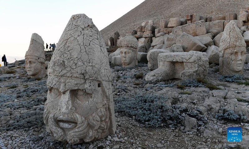 People visit the tomb-sanctuary on Mount Nemrut in Adiyaman Province, Turkey, on June 7, 2022. Mount Nemrut (Nemrut Dag) was inscribed on UNESCO World Heritage List in 1987. On Mount Nemrut, the mausoleum of Antiochus I, who reigned over Commagene, a kingdom founded north of Syria and the Euphrates after the breakup of Alexander's empire, is one of the most ambitious constructions of the Hellenistic period.(Photo: Xinhua)