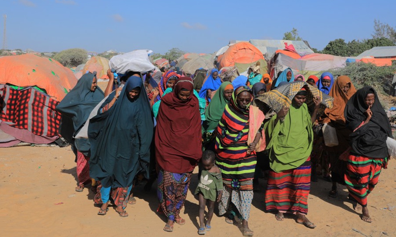 People are seen at a camp on the outskirts of Mogadishu, capital of Somalia, Feb. 4, 2022. (Photo: Xinhua)
