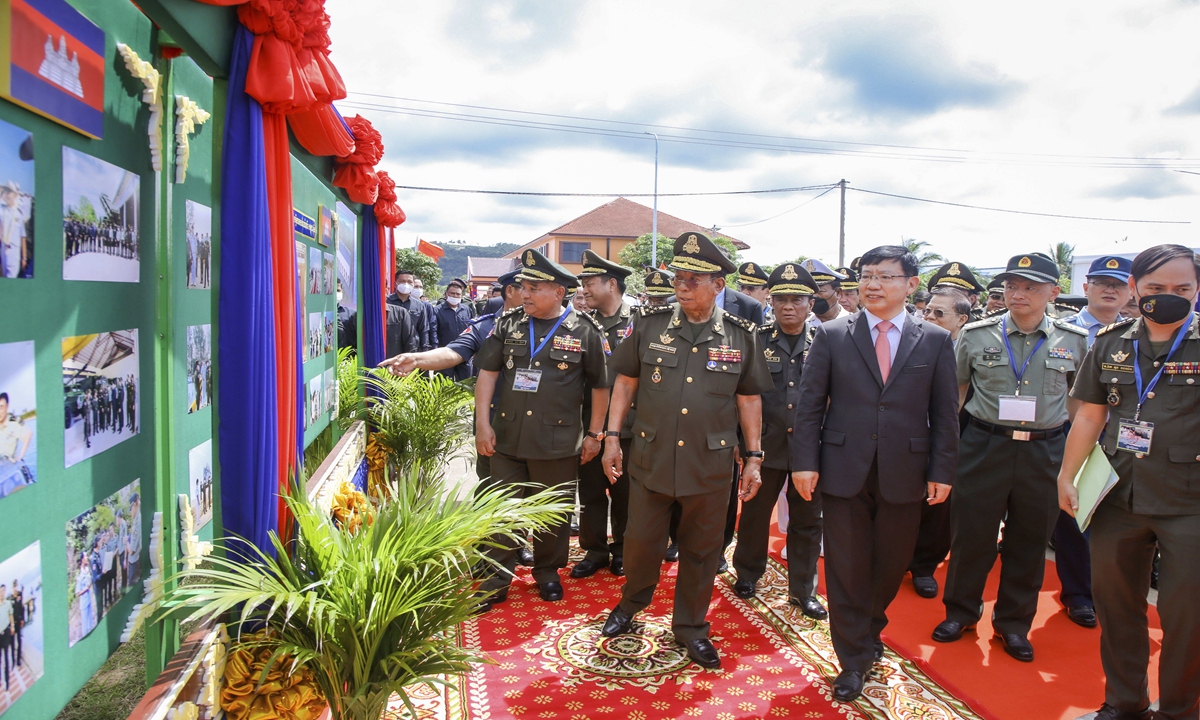 Cambodian Defense Minister Tea Banh, center left, and Chinese Ambassador to Cambodia Wang Wentian, center right, visit the site of the groundbreaking ceremony for an upgrade project in the Ream Naval Base, June 8, 2022. Photo: VCG