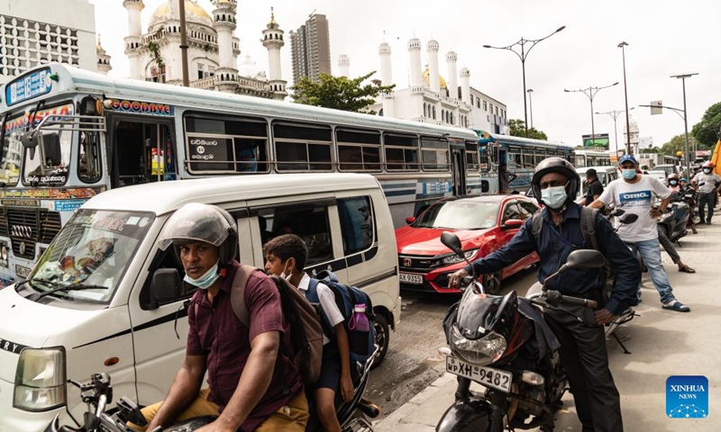 Vehicles queue for fuel on a street in Colombo, Sri Lanka on June 6, 2022. Sri Lankan Prime Minister Ranil Wickremesinghe said here on Tuesday the next three weeks would be tough as the nation is facing a severe economic crisis, urging citizens to use fuel and gas sparingly.(Photo: Xinhua)