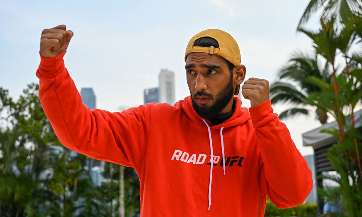 Indian mixed martial arts fighter Anshul Jubli poses for a photograph in Singapore on June 8, 2022. Photo: VCG