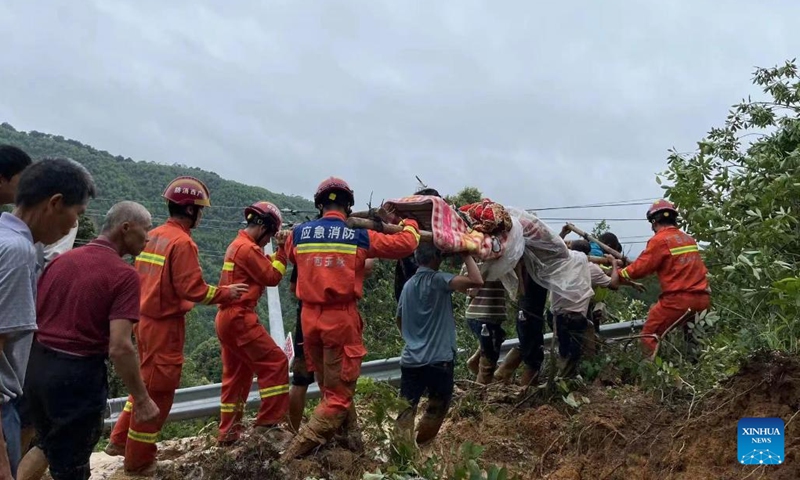 A trapped villager is rescued in Dacun Village of Xinfeng Town, Beiliu City of south China's Guangxi Zhuang Autonomous Region, June 9, 2022.(Photo: Xinhua)