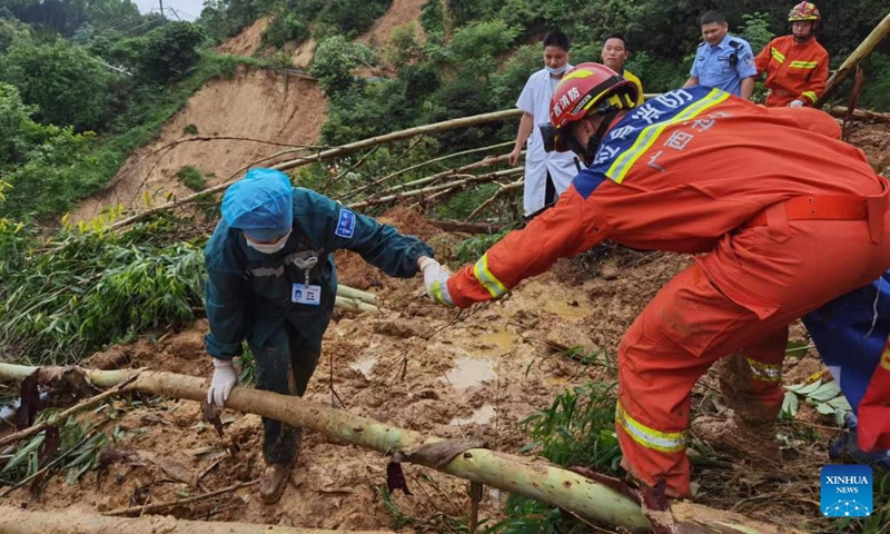 Rescuers head for a landslide site after heavy rains in Dacun Village of Xinfeng Town, Beiliu City of south China's Guangxi Zhuang Autonomous Region, June 9, 2022.(Photo: Xinhua)