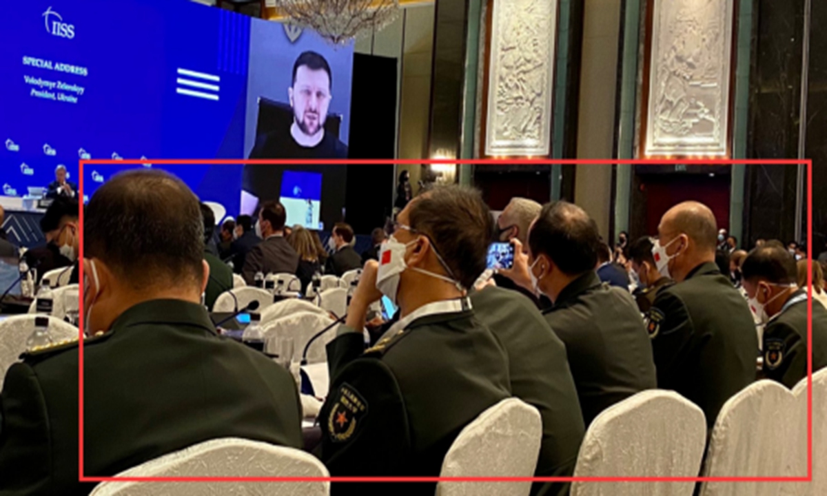 The Chinese delegation are seen at the meeting venue throughout Zelensky's speech on June 11, 2022 at the Shangri-La Dialogue summit in Singapore. Photo: snapshot from Twitter.