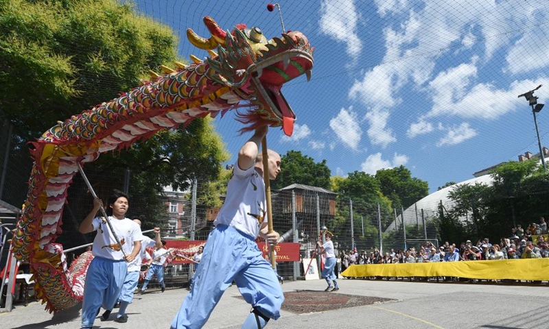 A dragon dance is performed during a Shaolin cultural festival in Vienna, Austria, June 11, 2022.Photo:Xinhua