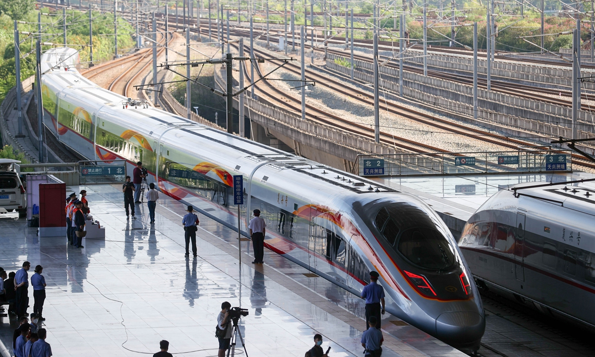 A bullet train departs from Wuhan, Central China's Hubei Province on June 20, 2022, the day when the Beijing-Wuhan section of the Beijing-Guangzhou high-speed link began operating at 350 kilometers per hour. Photo: cnsphoto