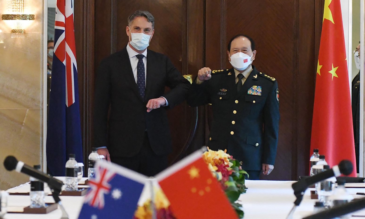 Australia's Defence Minister Richard Marles (L) meets with China's Defence Minister Wei Fenghe on the sidelines of the Shangri-La Dialogue summit in Singapore on June 12, 2022. Photo: AFP