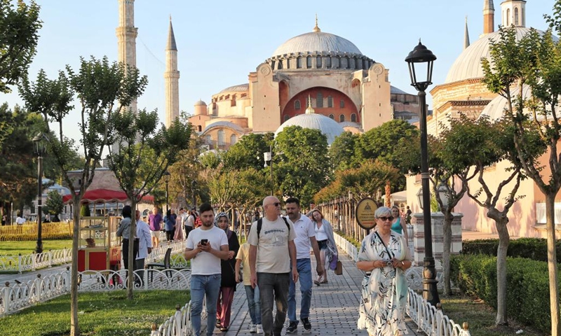 Tourists walk near Hagia Sophia in Istanbul, Turkey, on June 14, 2022.(Photo: Xinhua)
