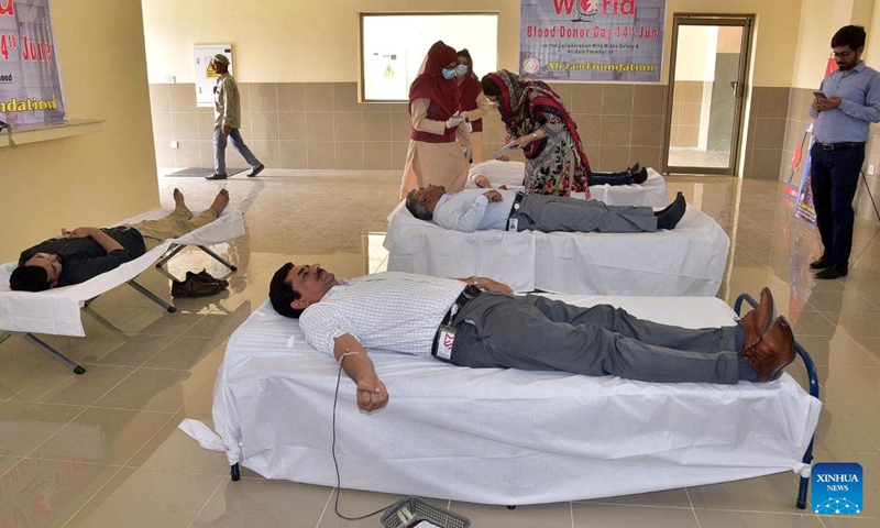 People donate blood at a blood center on World Blood Donor Day in Lahore, Pakistan, on June 14, 2022. World Blood Donor Day is marked on June 14 each year.(Photo: Xinhua)