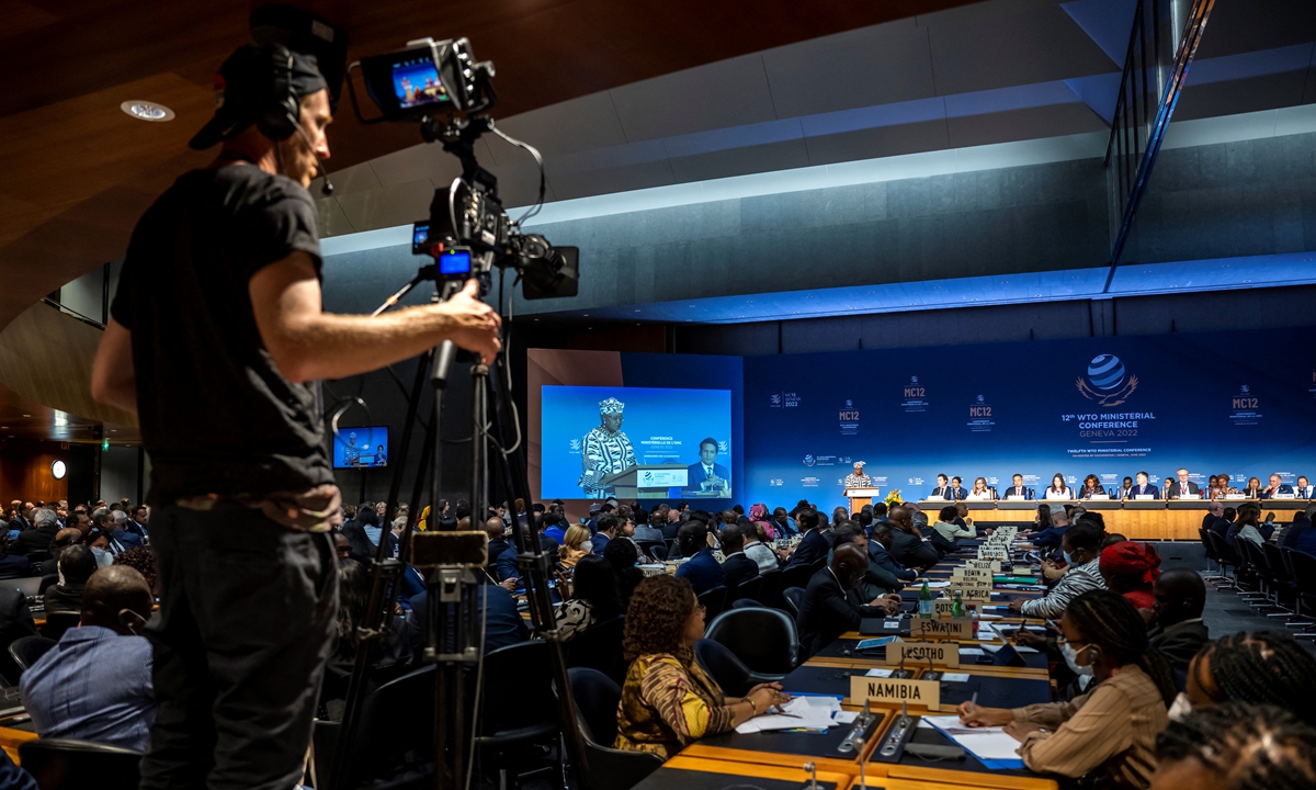 Official delegations listen to the speech of Nigerian Director General of the World Trade Organisation (WTO) Ngozi Okonjo-Iweala, at the opening ceremony of the 12th Ministerial Conference (MC12) at the headquarters of the WTO in Geneva on June 12, 2022. Photo: AFP