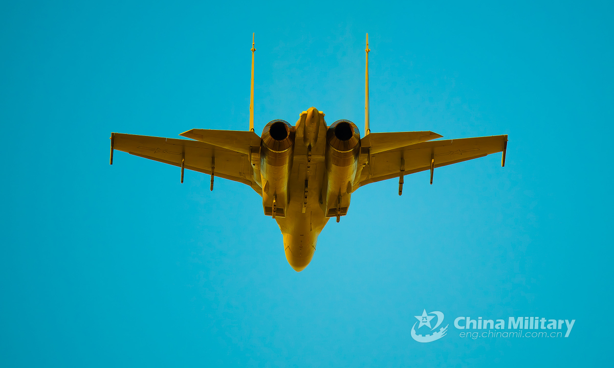 A J-16 fighter jet attached to a PLA air force base soars to the designated airspace during an air combat training exercise involving multi-type fighter jets on May 17, 2022. (eng.chinamil.com.cn/Photo by Yang Jun)