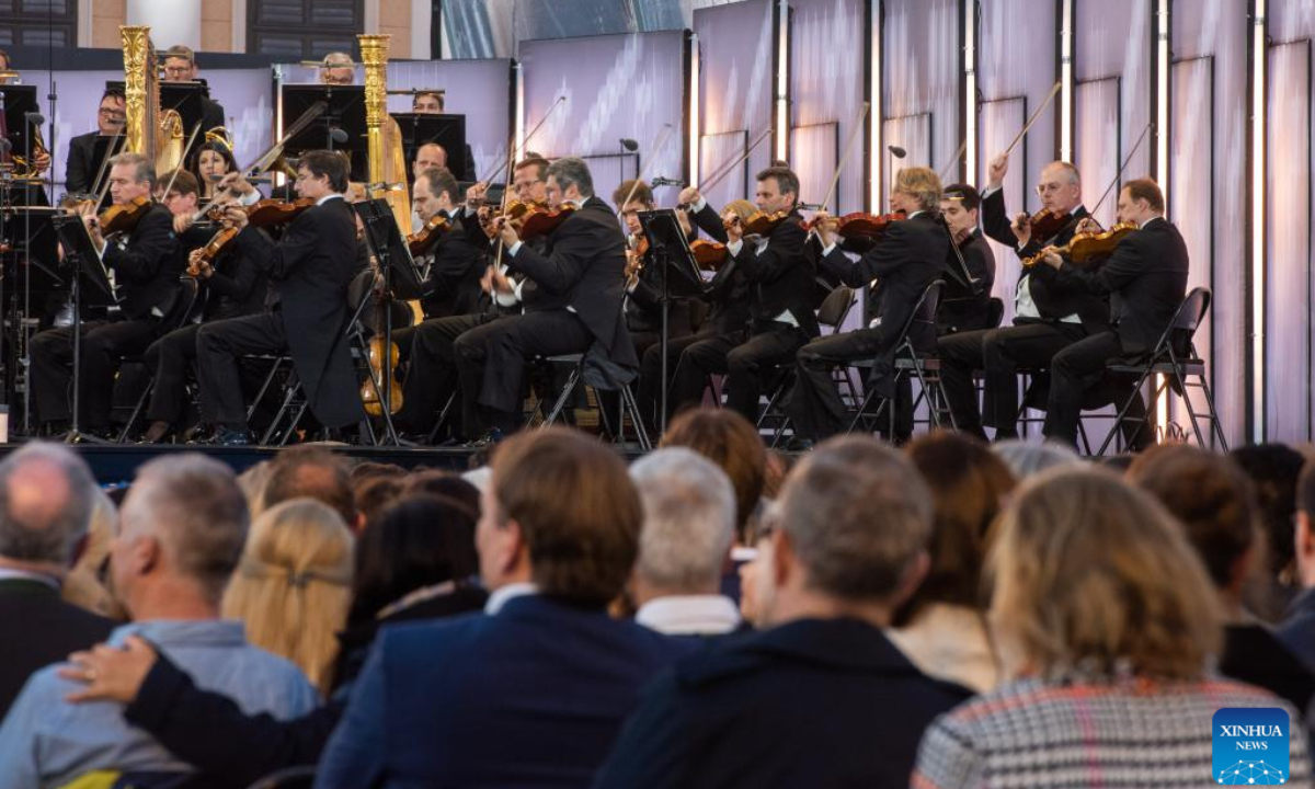 Members of the Vienna Philharmonic perform during the Summer Night Concert at the park of Schoenbrunn Palace in Vienna, Austria, on June 16, 2022. The Summer Night Concert 2022 was staged here by the Vienna Philharmonic on Thursday. Photo:Xinhua