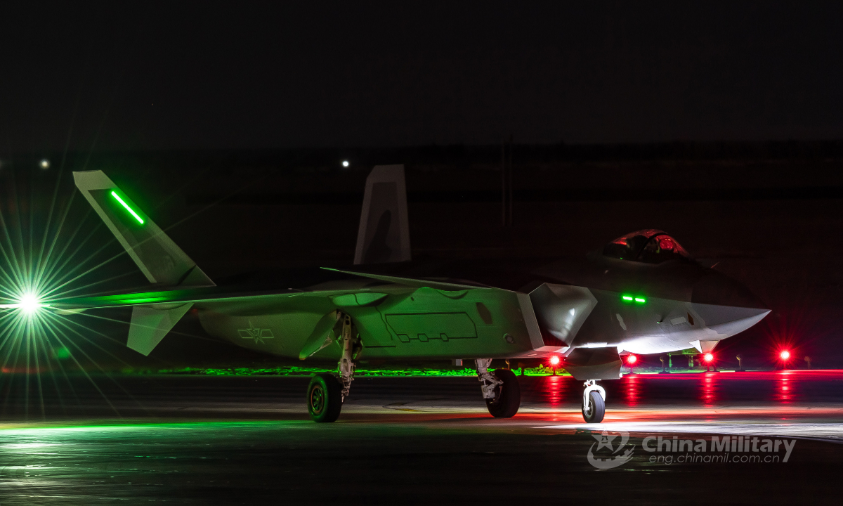 A J-20 fighter jet attached to a PLA air force base stands ready on the runway for the upcoming air combat training exercise involving multi-type fighter jets on May 17,<strong>888slot link alternatif</strong> 2022. (eng.chinamil.com.cn/Photo by Yang Jun)