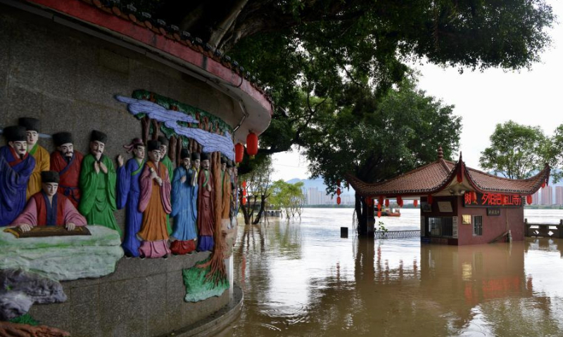 The Jinshan Temple is flooded by the rising Wulongjiang River water in Fuzhou, Fujian Province, June 14, 2022. (Photo: China News Service/Zhang Bin)