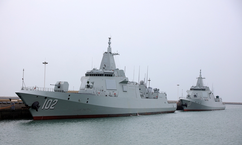 Two Type 055 large destroyers, the <em>Nanchang</em> and the Lhasa, are moored at a naval port in 2021. File photo: Courtesy of the Chinese People's Liberation Army Navy