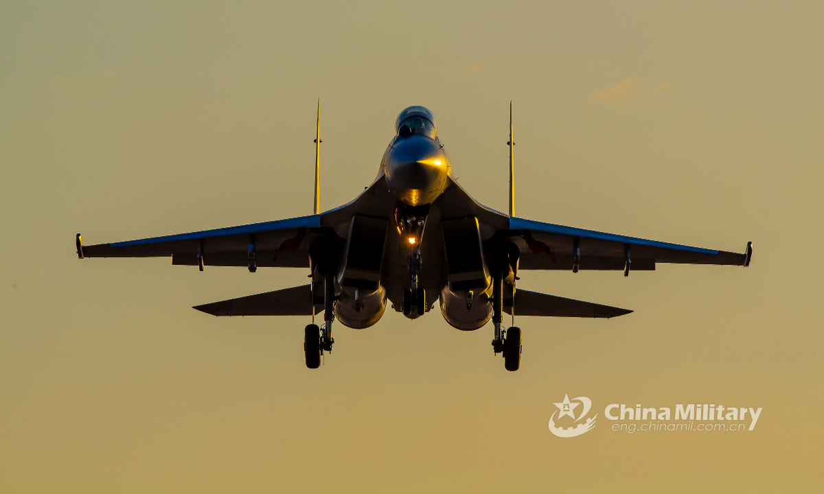 A J-16 fighter jet attached to a PLA air force base soars to the designated airspace during an air combat training exercise involving multi-type fighter jets on May 17, 2022. (eng.chinamil.com.cn/Photo by Yang Jun)