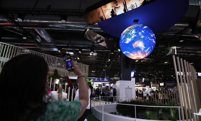 Attendees visit the VivaTech technology startups and innovation fair during its opening day in Paris, France, June 15, 2022. The 2022 VivaTech technology startups and innovation fair kicked off here on Wednesday, and will last until Saturday. More than 2,000 exhibitors participated in the event. VivaTech is the world's rendezvous for startups and leaders to celebrate innovation and the power of technology in transforming business and society. (Xinhua/Gao Jing)