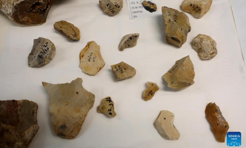 Photo taken on June 15, 2022 shows pieces of flint tools with traces of fire use at Weizmann Institute of Science in Rehovot, Israel. Israeli researchers have found traces of fire use dating back at least 800,000 years ago with artificial intelligence (AI), the Weizmann Institute of Science (WIS) in central Israel said on Monday.(Photo: Xinhua)