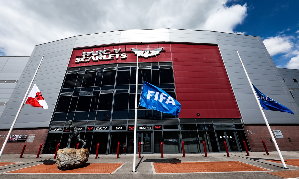 Flags fly at half mast outside Parc y Scarlets in Llanelli in tribute to Welsh rugby legend Phil Bennett who died on June 12, 2022. Photo: IC