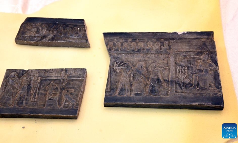 Smuggled Pharaonic artifacts are displayed during the handover in Kuwait City, Kuwait, on June 16, 2022. Kuwait returned on Thursday five smuggled Pharaonic artifacts to Egypt, a Kuwaiti official said.(Photo: Xinhua)