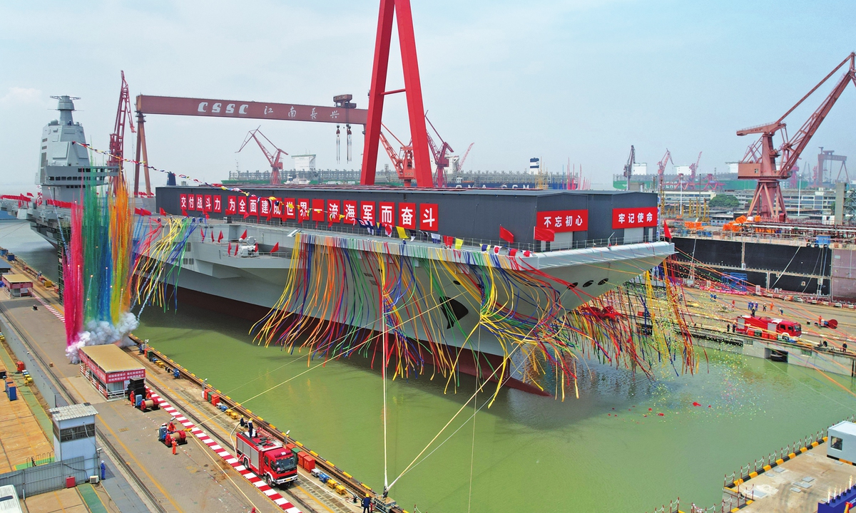 China launches the country's third aircraft carrier, the <em>Fujian</em>, in Shanghai on June 17, 2022. Photo: Xinhua