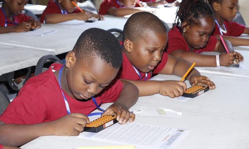 Students take part in an abacus mental math competition in Port Harcourt, Nigeria, on June 18, 2022.Photo:Xinhua