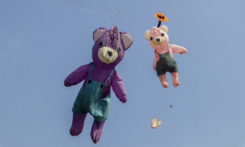 Bear-shaped kites fly in the sky during the World Kite Festival in Bogor, West Java, Indonesia, June 19, 2022.Photo:Xinhua