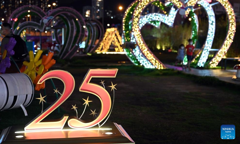 A celebratory decoration is illuminated for the 25th anniversary of Hong Kong's return to the motherland in Hong Kong, south China, June 18, 2022.Photo:Xinhua