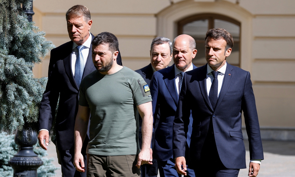 (From left) Romanian President Klaus Iohannis, Ukrainian President Volodymyr Zelensky,  Italian Prime Minister Mario Draghi, German Chancellor Olaf Scholz and French President Emmanuel Macron arrive for a press conference in at Mariinsky Palace in Kiev,on June 16, 2022.