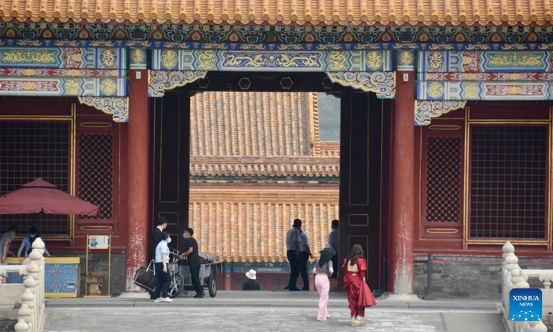 People visit the Palace Museum, also known as the Forbidden City, in Beijing, capital of China, June 19, 2022. As the epidemic situation in the city is improving, the number of visitors to the Palace Museum in Beijing has increased gradually.Photo:Xinhua