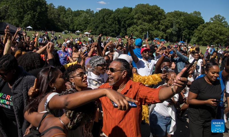 People take part in a celebration of Juneteenth in Prospect Park in the Brooklyn borough of New York, the United States, June 19, 2022. Celebrated on June 19, the holiday marks the day in 1865 when Union Major General Gordon Granger issued General Order No. 3 in Galveston, Texas, emancipating the remaining enslaved people in the state. For enslaved Americans in Texas, freedom came two and a half years after President Abraham Lincoln issued the Emancipation Proclamation.(Photo: Xinhua)