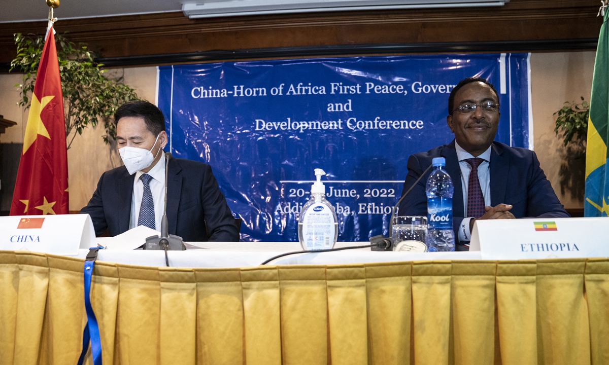 Xue Bing, China's first special envoy to the HoA (L) and Redwan Hussein (R), National security advisor to the Prime Minister of Ethiopia attend the first HoA peace conference in Addis Ababa, Ethiopia, on June 20, 2022. Photo: AFP