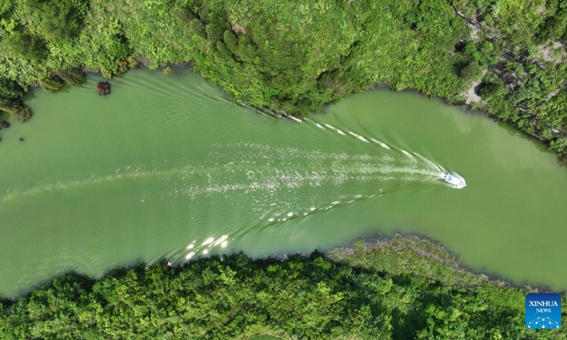 Aerial photo taken on June 21, 2022 shows the view of Xiaxi Reservoir in Cengong County, Qiandongnan Miao and Dong Autonomous Prefecture, southwest China's Guizhou Province.(Photo: Xinhua)