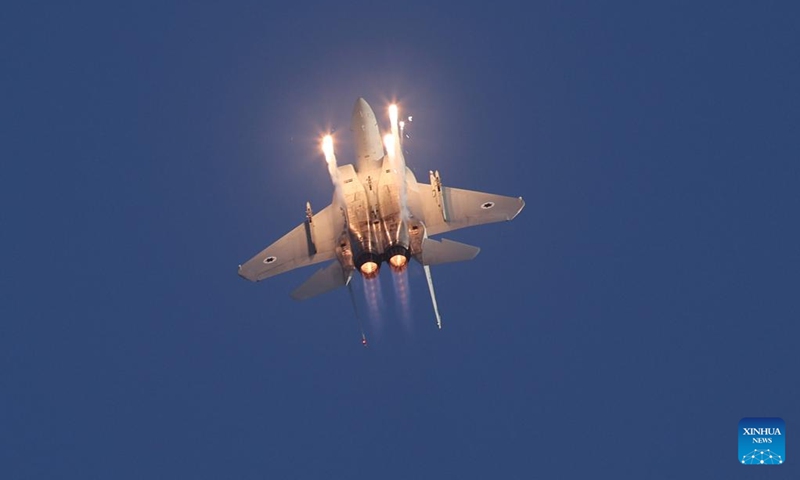 An aircraft performs during an Israeli Air Force (IAF) graduation ceremony at Hatzerim Airbase near Be'er Sheva, Israel, on June 23, 2022.(Photo: Xinhua)
