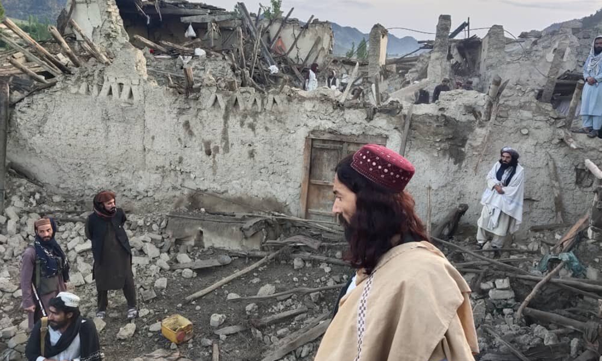 Afghans look at destruction caused by an earthquake in the province of Paktika, eastern Afghanistan on June 22, 2022. The earthquake has killed at least 1,000 people and injuring 1,500. Photo: VCG