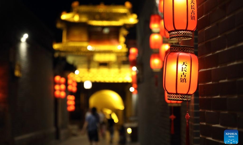 Photo taken on June 21, 2022 shows the night scenery of an ancient town in Tianchang Township of Jingxing County, north China's Hebei Province. Historical sites have been renovated and infrastructure has been improved in the ancient town of Tianchang Township for better preserving the cultural heritage and attracting more tourists.(Photo: Xinhua)