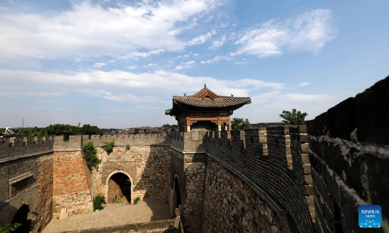 Photo taken on June 21, 2022 shows one city gate of an ancient town in Tianchang Township of Jingxing County, north China's Hebei Province. Historical sites have been renovated and infrastructure has been improved in the ancient town of Tianchang Township for better preserving the cultural heritage and attracting more tourists.(Photo: Xinhua)