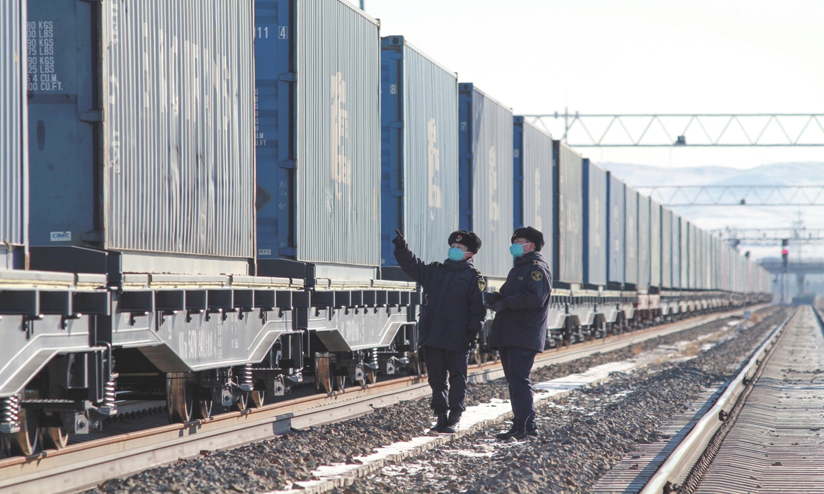 Manzhouli port customs officers inspect the China-Europe train at the Manzhouli port. Photo: Courtesy of Zhang Liping