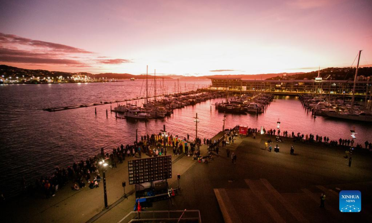 People look into the sky at seaside to celebrate the Maori New Year in Wellington, New Zealand, June 24, 2022. New Zealanders celebrated Matariki, or the Maori New Year, as an official public holiday for the first time on Friday. Photo:Xinhua