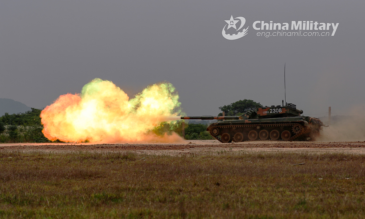 A main battle tank attached to a combined-arms brigade of the army under the PLA Eastern Theater Command fires at simulated target in the field during a gunnery training exercise on June 1, 2022. (eng.chinamil.com.cn/Photo by Zhang Wenju)