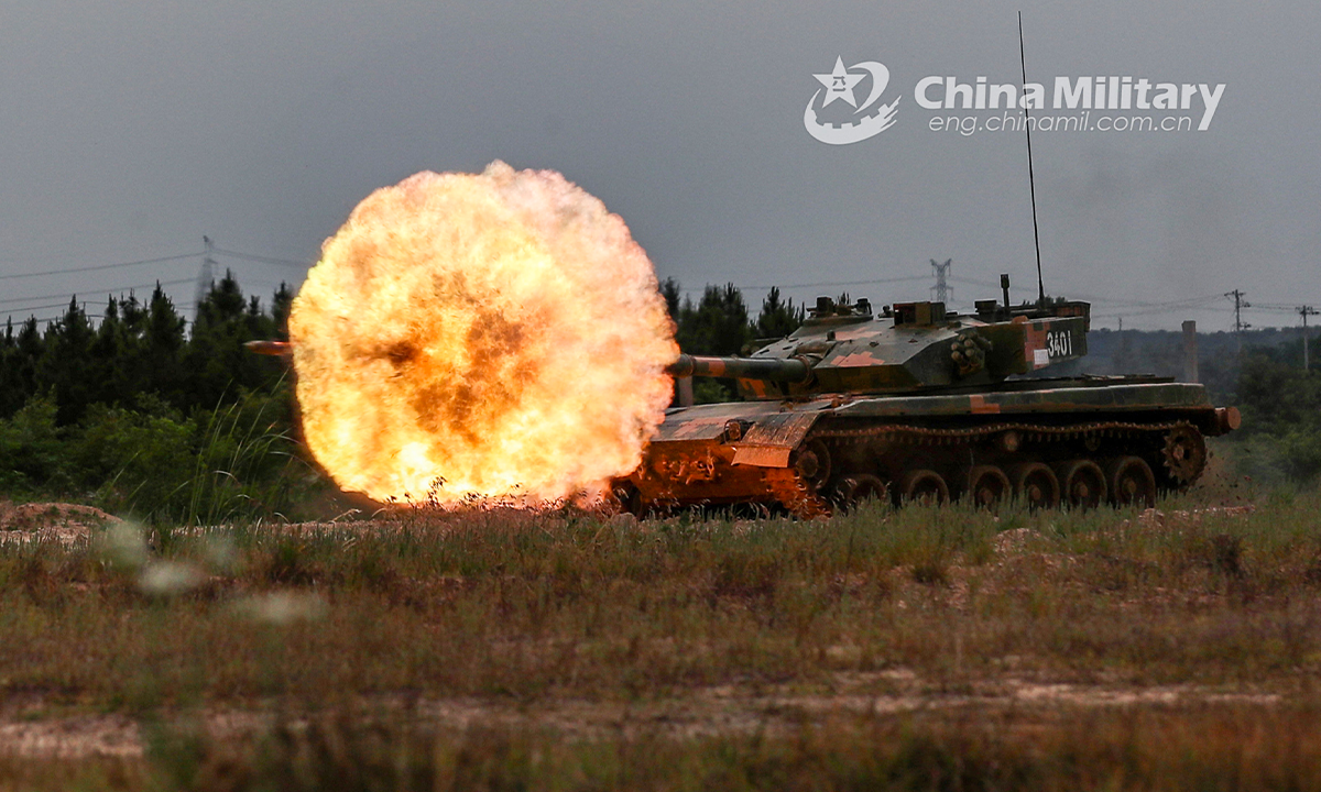 A main battle tank attached to a combined-arms brigade of the army under the PLA Eastern Theater Command fires at simulated target in the field during a gunnery training exercise on June 1, 2022. (eng.chinamil.com.cn/Photo by Zhang Wenju) 