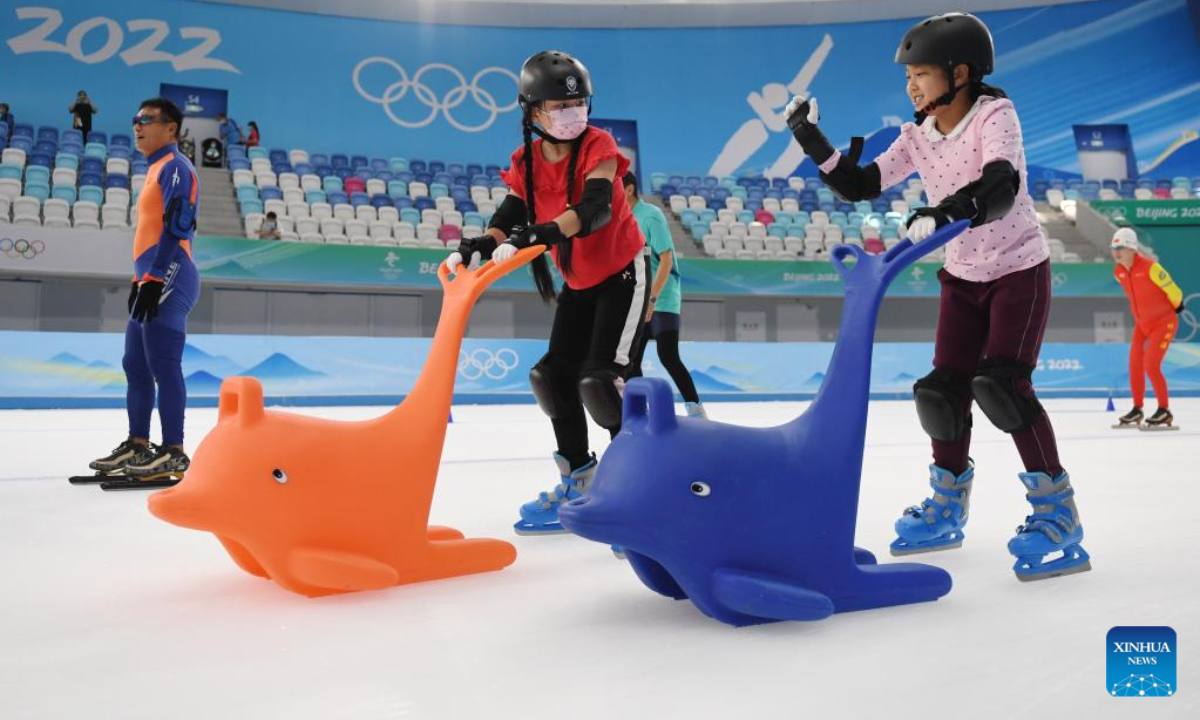 Tourists skate at the National Speed Skating Oval in Beijing, capital of China, July 9, 2022. The National Speed Skating Oval, also known as the Ice Ribbon, opened to the public on Saturday. Photo:Xinhua