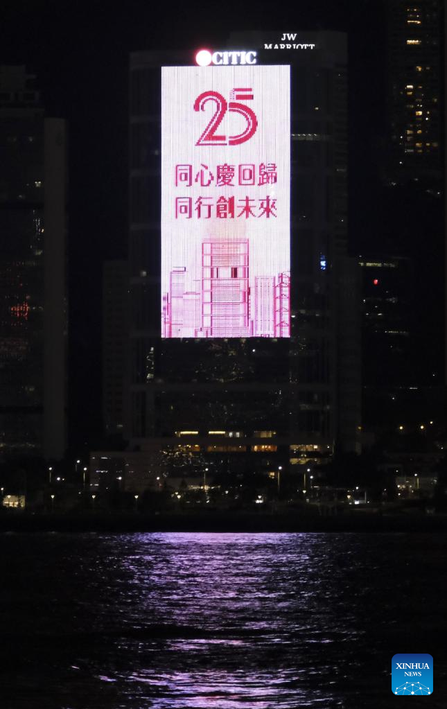 Photo taken on June 25, 2022 shows a light show in Tsim Sha Tsui, south China's Hong Kong. Hong Kong will celebrate the 25th anniversary of its return to the motherland. (Xinhua/Wang Shen)