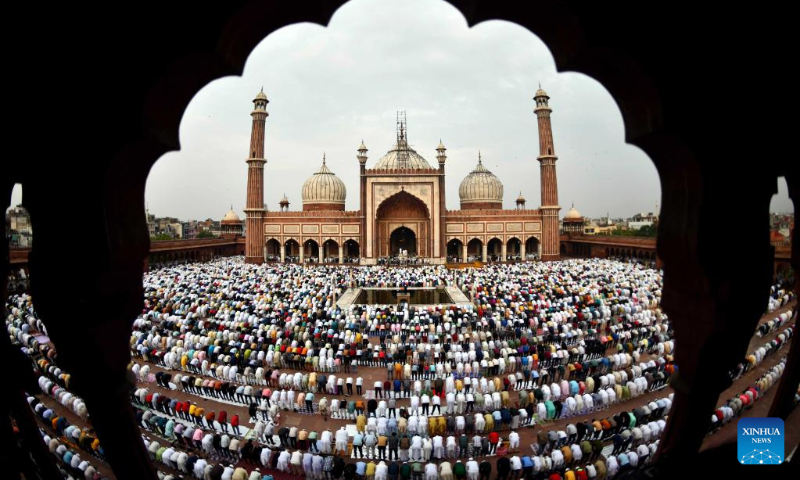 Muslims offer Eid-al-Adha prayers at the Jama Masjid in Delhi, India, on July 10, 2022. (Photo by Partha Sarkar/Xinhua)