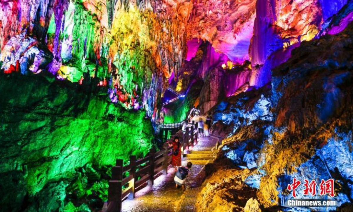 Scenery of Taigu kast cave illuminated by color lights in Youyang Tujia and Miao Autonomous County, southwest China's Chongqing, July 6, 2022. Photo:China News Service