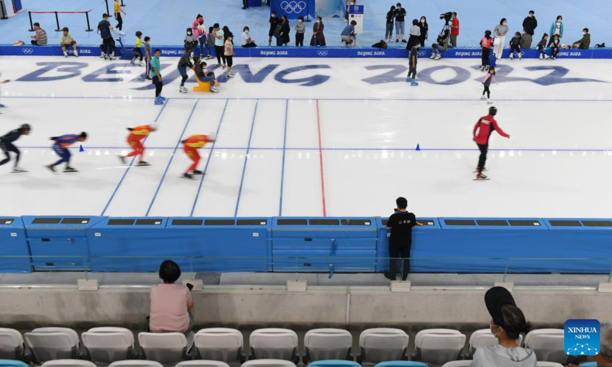 People visit the National Speed Skating Oval in Beijing, capital of China, July 9, 2022. The National Speed Skating Oval, also known as the Ice Ribbon, opened to the public on Saturday. Photo:Xinhua