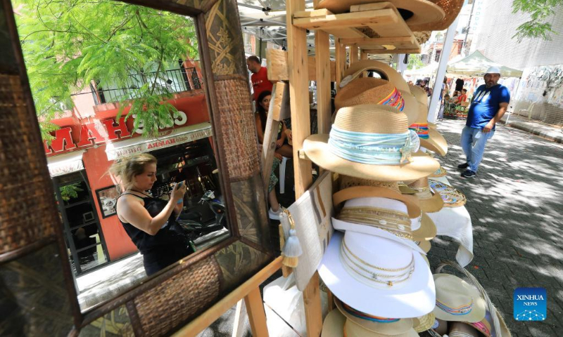A hat booth is seen at the Life Beat Festival at the Hamra street in Beirut, Lebanon, June 26, 2022. (Xinhua/Liu Zongya)