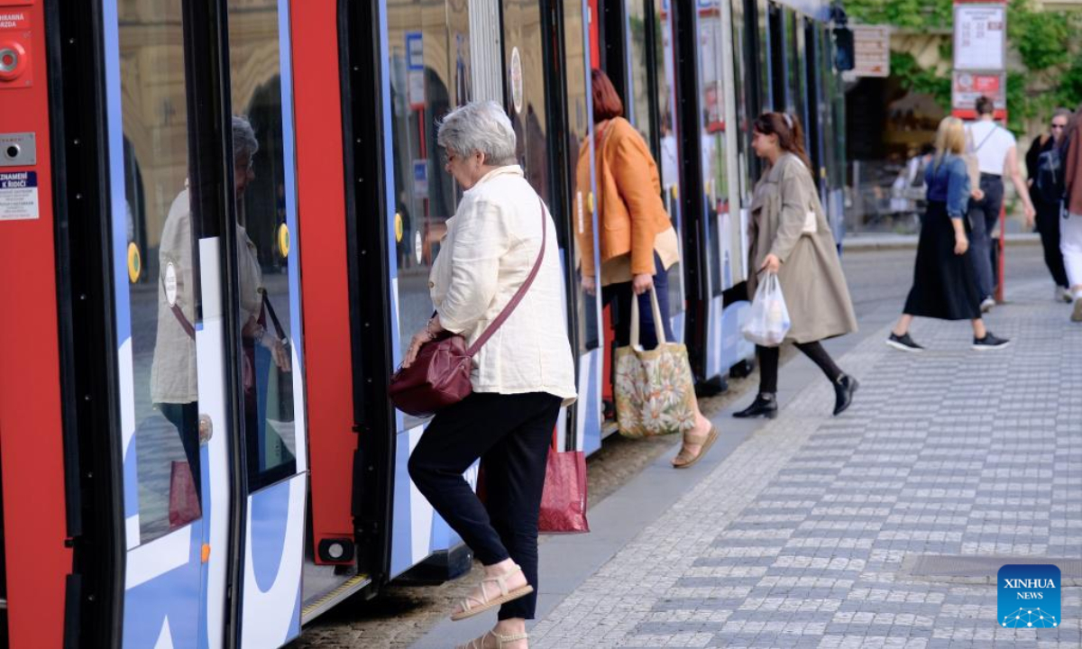 People get on a tram at a station in Prague, capital of the Czech Republic, July 8, 2022. Photo:Xinhua